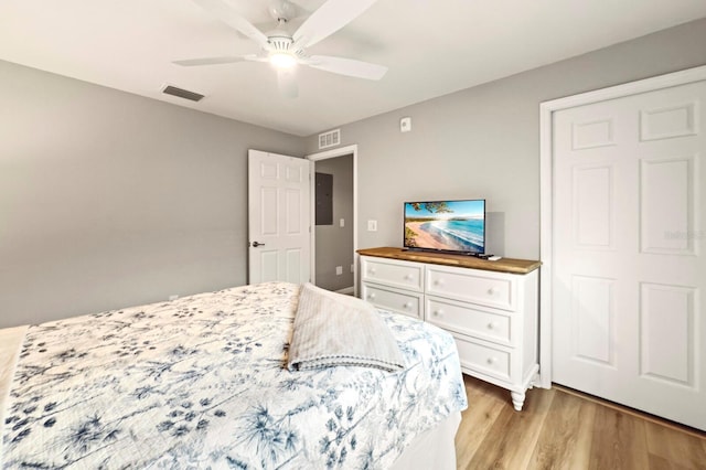 5624 Palmer Cir Unit 206, Bradenton, FL 34211 - bedroom with light wood-type flooring and ceiling fan