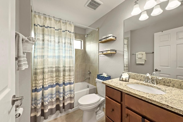 5624 Palmer Cir Unit 206, Bradenton, FL 34211 - bathroom with shower / bathtub combination with curtain, vanity, and a textured wall