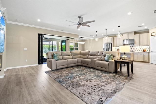 8272 Summer Night Rd, Sarasota, FL 34241 - living room with ceiling fan, recessed lighting, light wood-style flooring, baseboards, and ornamental molding