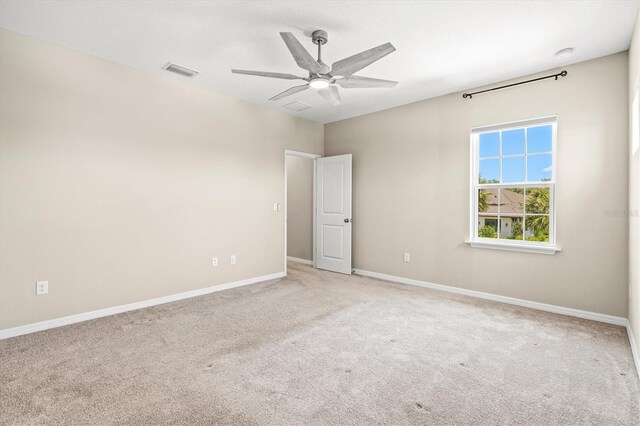 8272 Summer Night Rd, Sarasota, FL 34241 - unfurnished room featuring carpet floors, a ceiling fan, baseboards, and a smoke detector