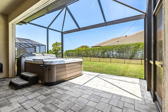 8272 Summer Night Rd, Sarasota, FL 34241 - view of patio / terrace with a hot tub and glass enclosure