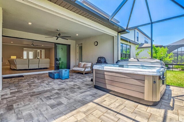 8272 Summer Night Rd, Sarasota, FL 34241 - view of patio with a hot tub, a ceiling fan, outdoor lounge area, and glass enclosure