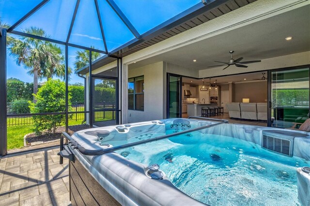 8272 Summer Night Rd, Sarasota, FL 34241 - view of swimming pool featuring a hot tub, a lanai, ceiling fan, and a patio area
