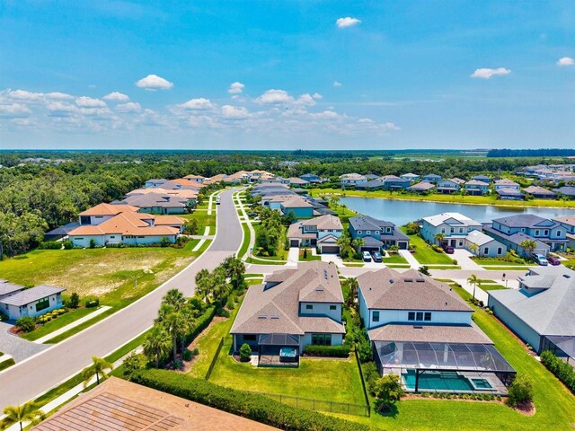 8272 Summer Night Rd, Sarasota, FL 34241 - aerial perspective of suburban area with a nearby body of water