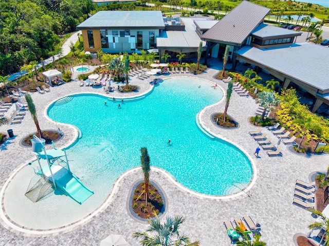 8272 Summer Night Rd, Sarasota, FL 34241 - community pool with a patio