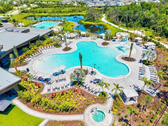 8272 Summer Night Rd, Sarasota, FL 34241 - community pool with a water slide and a water view