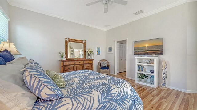 4220 Miriana Way, Sarasota, FL 34233 - bedroom with light wood finished floors, baseboards, crown molding, and a ceiling fan