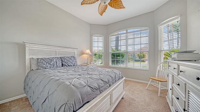4220 Miriana Way, Sarasota, FL 34233 - bedroom with light carpet, multiple windows, and baseboards