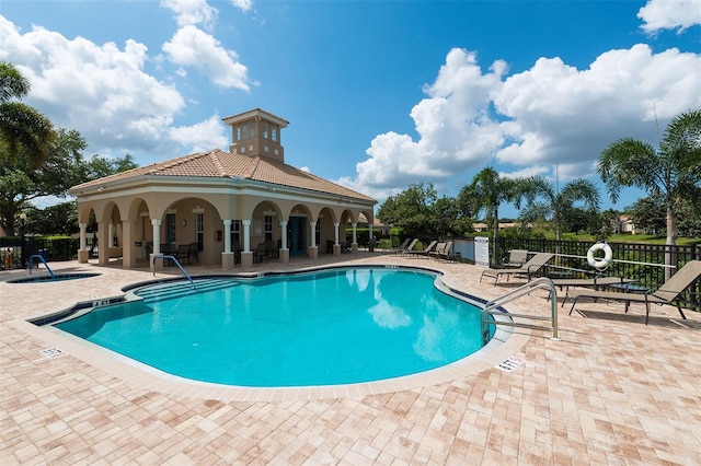 4220 Miriana Way, Sarasota, FL 34233 - community pool with a patio and a hot tub