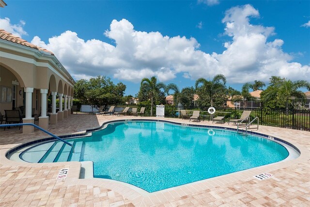 4220 Miriana Way, Sarasota, FL 34233 - community pool featuring a patio