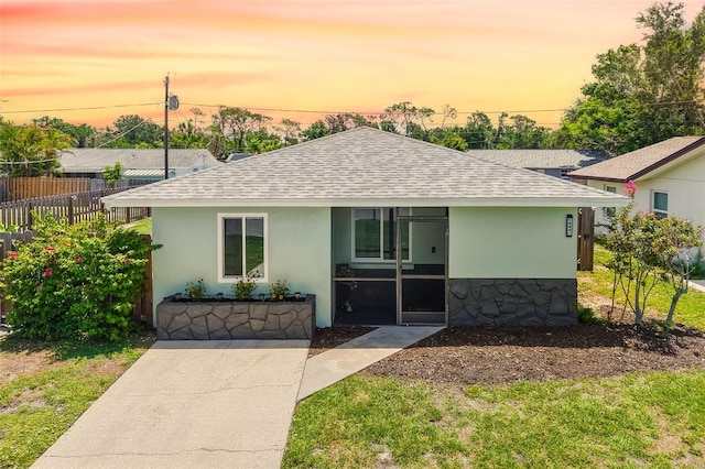 1040 Hope St, Venice, FL 34285 - single story home featuring roof with shingles and stucco siding