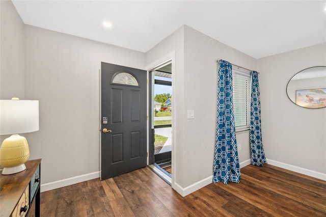 1040 Hope St, Venice, FL 34285 - foyer featuring wood finished floors and baseboards