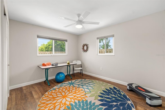 1040 Hope St, Venice, FL 34285 - home office featuring plenty of natural light, baseboards, a ceiling fan, and wood finished floors