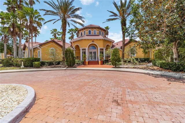 5401 Bentgrass Dr Unit 1-113, Sarasota, FL 34235 - view of front of home featuring french doors and stucco siding