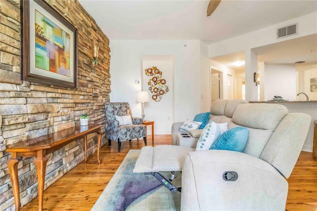 5401 Bentgrass Dr Unit 1-113, Sarasota, FL 34235 - living room with light wood-style floors and baseboards