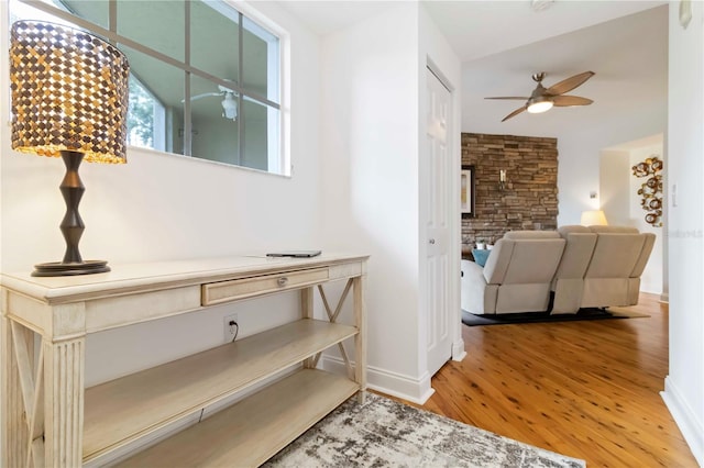 5401 Bentgrass Dr Unit 1-113, Sarasota, FL 34235 - hallway with wood finished floors and baseboards