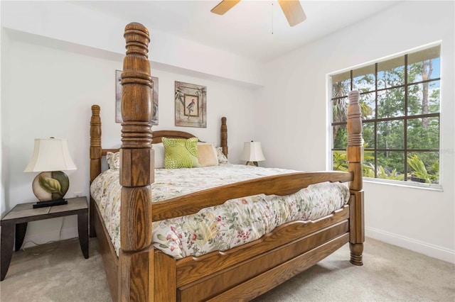 5401 Bentgrass Dr Unit 1-113, Sarasota, FL 34235 - bedroom featuring carpet flooring, baseboards, and a ceiling fan
