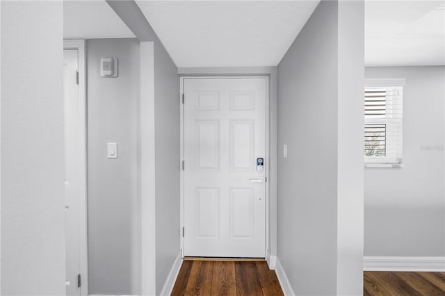 9393 Midnight Pass Rd Unit 603, Sarasota, FL 34242 - corridor featuring dark wood-style flooring and baseboards