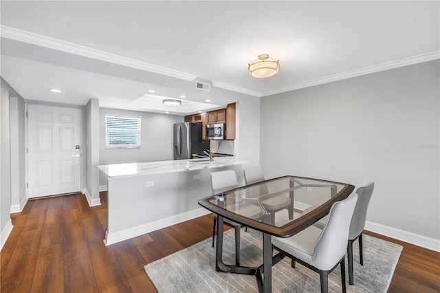 9393 Midnight Pass Rd Unit 603, Sarasota, FL 34242 - dining room with baseboards, dark wood-style floors, crown molding, and recessed lighting