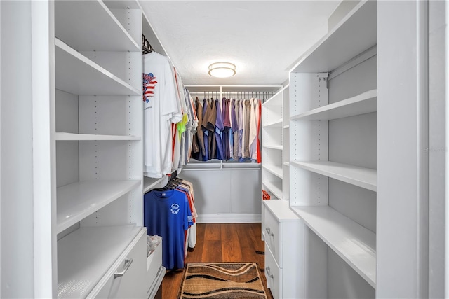 9393 Midnight Pass Rd Unit 603, Sarasota, FL 34242 - spacious closet with dark wood-style floors