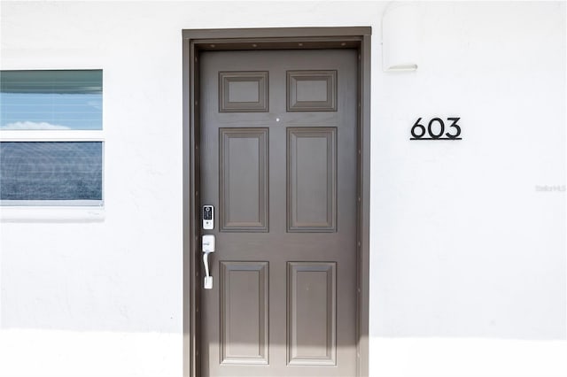 9393 Midnight Pass Rd Unit 603, Sarasota, FL 34242 - property entrance with stucco siding