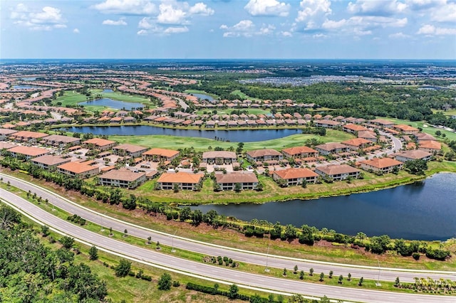 13711 Messina Loop Unit 102, Lakewood Ranch, FL 34211 - aerial view of residential area featuring a large body of water and a golf club