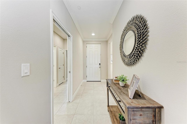 13711 Messina Loop Unit 102, Lakewood Ranch, FL 34211 - hall featuring crown molding, light tile patterned floors, and baseboards