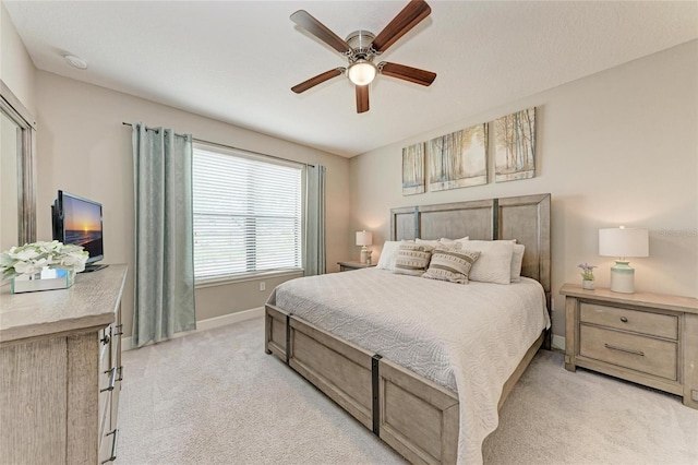 13711 Messina Loop Unit 102, Lakewood Ranch, FL 34211 - bedroom featuring baseboards, light colored carpet, and ceiling fan