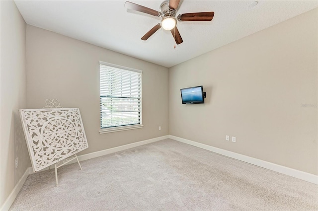 13711 Messina Loop Unit 102, Lakewood Ranch, FL 34211 - unfurnished room with carpet, baseboards, and a ceiling fan
