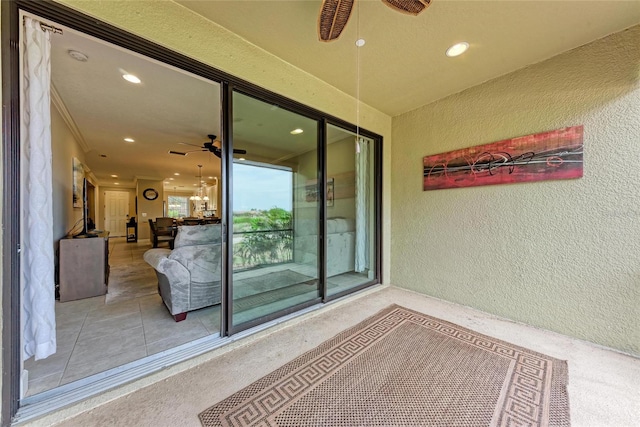 13711 Messina Loop Unit 102, Lakewood Ranch, FL 34211 - view of exterior entry with ceiling fan and stucco siding
