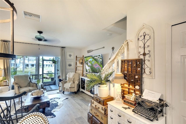4727 Sabal Key Dr Unit 4727, Bradenton, FL 34203 - living room with plenty of natural light and light wood-style flooring