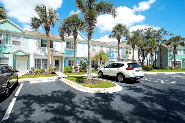 4727 Sabal Key Dr Unit 4727, Bradenton, FL 34203 - uncovered parking lot featuring a residential view