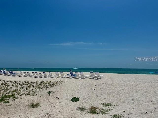 1100 Benjamin Franklin Dr Unit 802, Sarasota, FL 34236 - water view featuring local beach