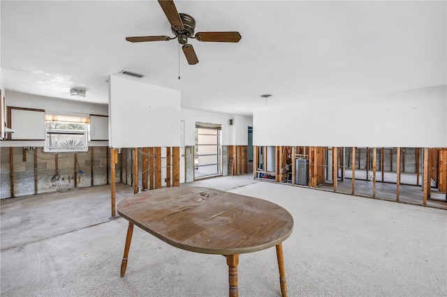 310 Avenida Milano, Sarasota, FL 34242 - misc room with healthy amount of natural light, ceiling fan, and concrete flooring