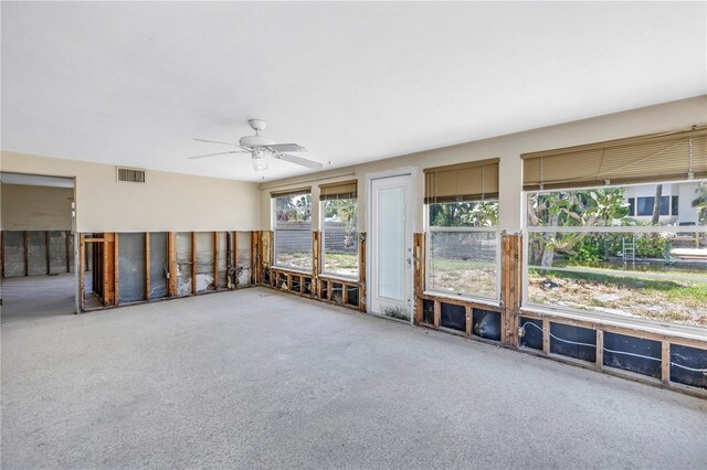 310 Avenida Milano, Sarasota, FL 34242 - unfurnished sunroom featuring a ceiling fan