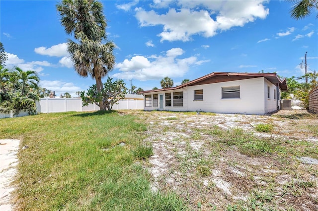 310 Avenida Milano, Sarasota, FL 34242 - rear view of property featuring cooling unit