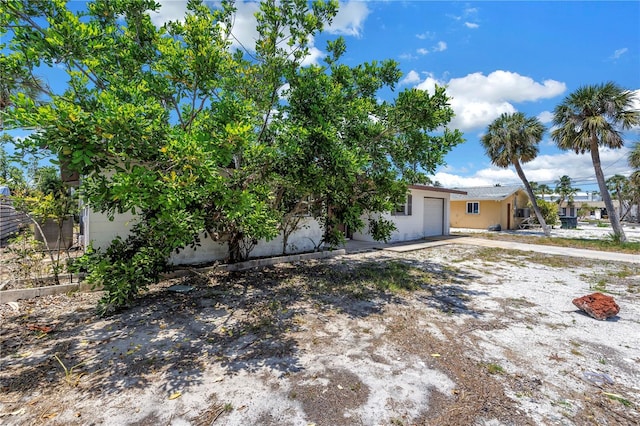 310 Avenida Milano, Sarasota, FL 34242 - view of front of home with an attached garage
