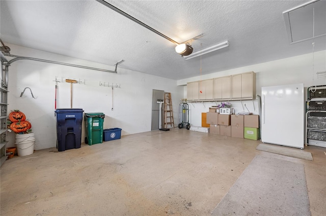 1612 Fairway Oaks Dr, Palmetto, FL 34221 - garage with freestanding refrigerator and a garage door opener