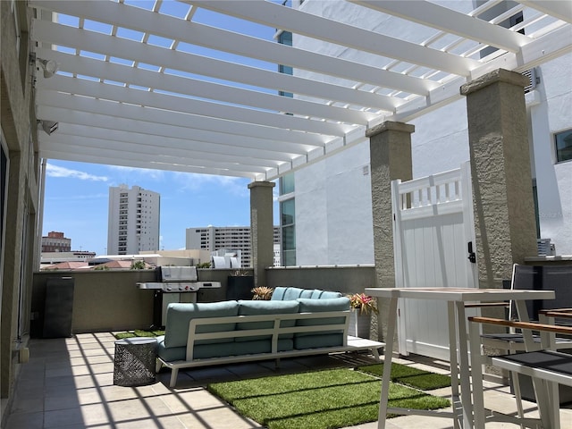 1345 2nd St, Sarasota, FL 34236 - view of patio featuring a pergola, a city view, and outdoor lounge area