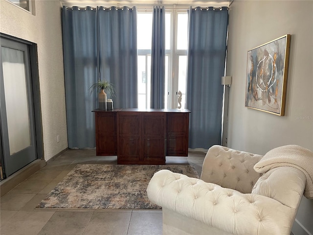 1345 2nd St, Sarasota, FL 34236 - living area with tile patterned floors