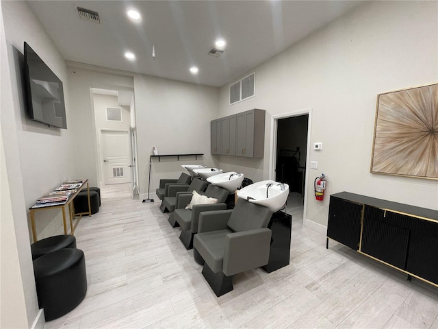 1345 2nd St, Sarasota, FL 34236 - living room featuring light wood-style floors, recessed lighting, and baseboards