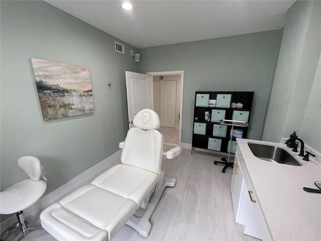 1345 2nd St, Sarasota, FL 34236 - office area featuring a sink, light wood finished floors, and recessed lighting