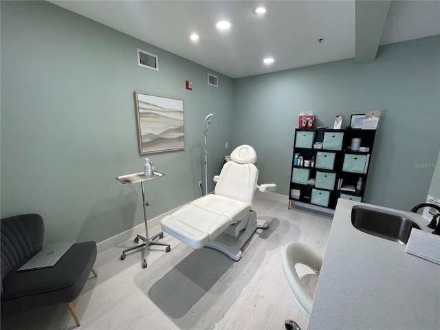 1345 2nd St, Sarasota, FL 34236 - office with light wood-style flooring, a sink, recessed lighting, and baseboards