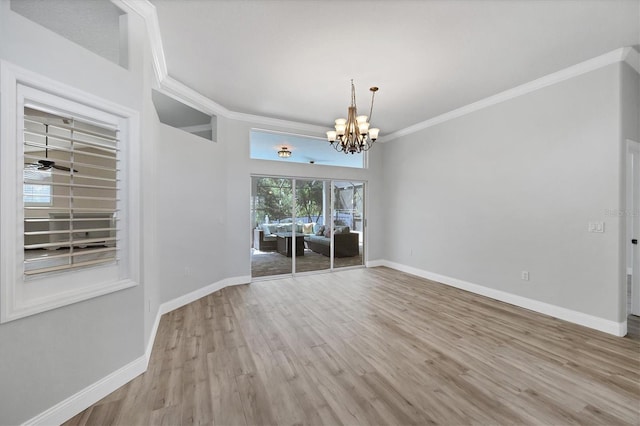 9016 30th St E, Parrish, FL 34219 - unfurnished room featuring light wood-style flooring, ornamental molding, a chandelier, and baseboards
