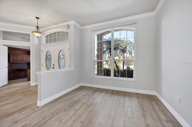 9016 30th St E, Parrish, FL 34219 - spare room with light wood-style floors, baseboards, and crown molding
