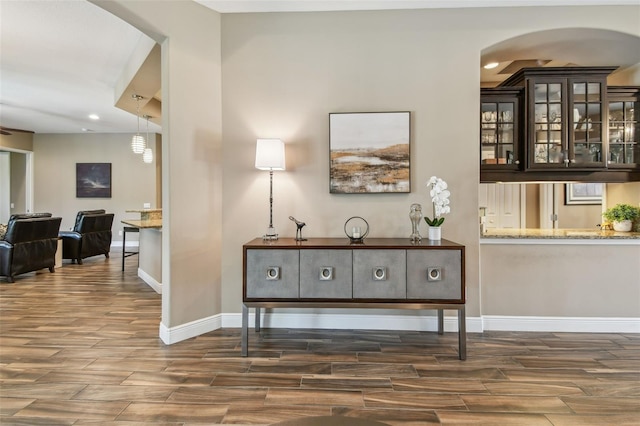 16246 26th St E, Parrish, FL 34219 - hall with wood tiled floors, baseboards, and recessed lighting