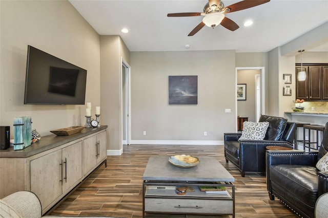 16246 26th St E, Parrish, FL 34219 - living area with dark wood-style flooring, ceiling fan, baseboards, and recessed lighting