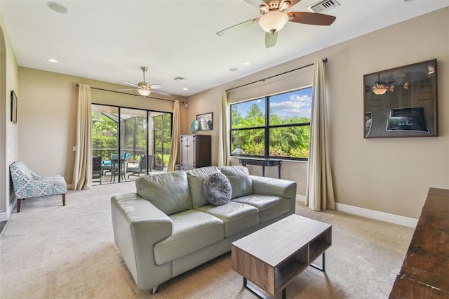16246 26th St E, Parrish, FL 34219 - living room featuring ceiling fan, light carpet, baseboards, and recessed lighting