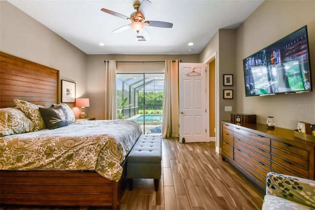 16246 26th St E, Parrish, FL 34219 - bedroom featuring access to exterior, wood finished floors, recessed lighting, baseboards, and a ceiling fan