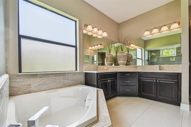 16246 26th St E, Parrish, FL 34219 - bathroom featuring double vanity, tile patterned floors, and a bath
